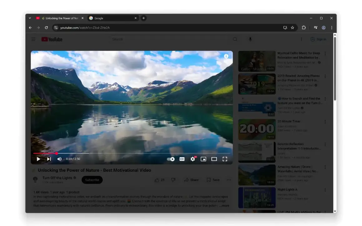 Widok na spokojne jezioro i góry, odbijające się w wodzie. W tle widać chmury. Interfejs YouTube z filmem i sugerowanymi treściami, wszystko w stylu motywy chrome.