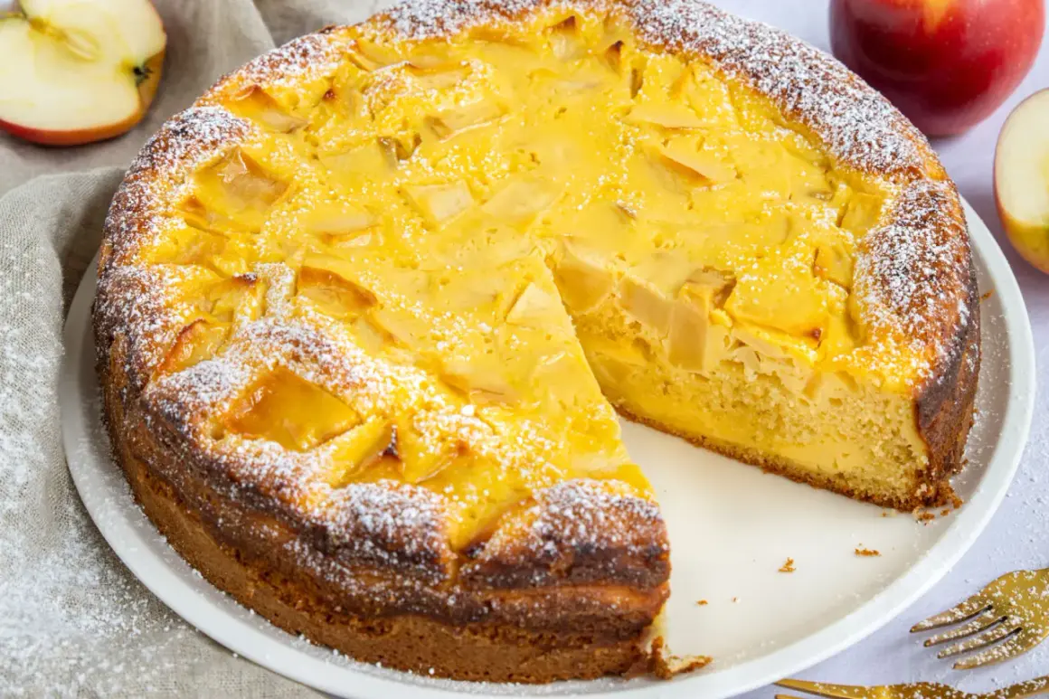 Ein saftiger Apfelkuchen, bestäubt mit Puderzucker. Dieses Apfelkuchen Rezept ist ein Genuss!