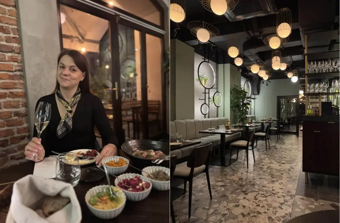 Kobieta z kieliszkiem wina w jednej z ciekawych restauracji okolic Krakowa. Wnętrze lokalu z nowoczesnym designem i stylowymi lampami.