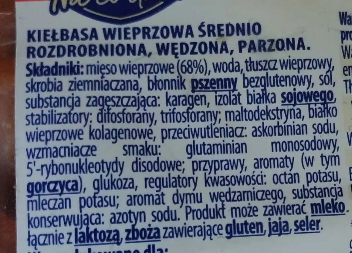 Fragment etykiety kiełbasy wieprzowej z widocznym składem i informacjami o produkcie.