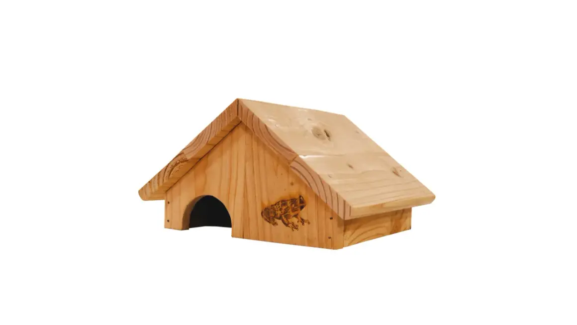 Maisonnette en bois pour fabriquer un abri pour grenouilles. Une gravure de grenouille décore la façade.