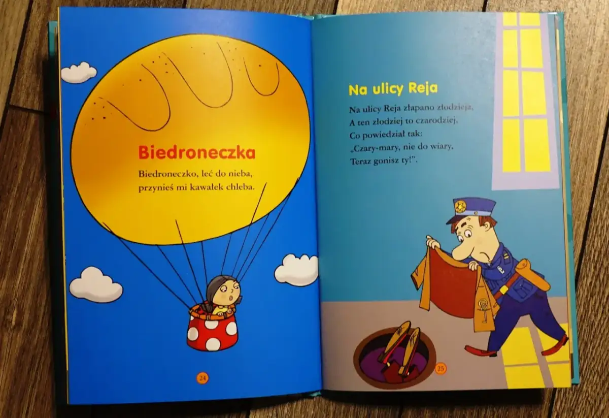 Otwarta książka z ilustracjami: biedronka w balonie i policjant przy studzience. Wierszyki dla dzieci.