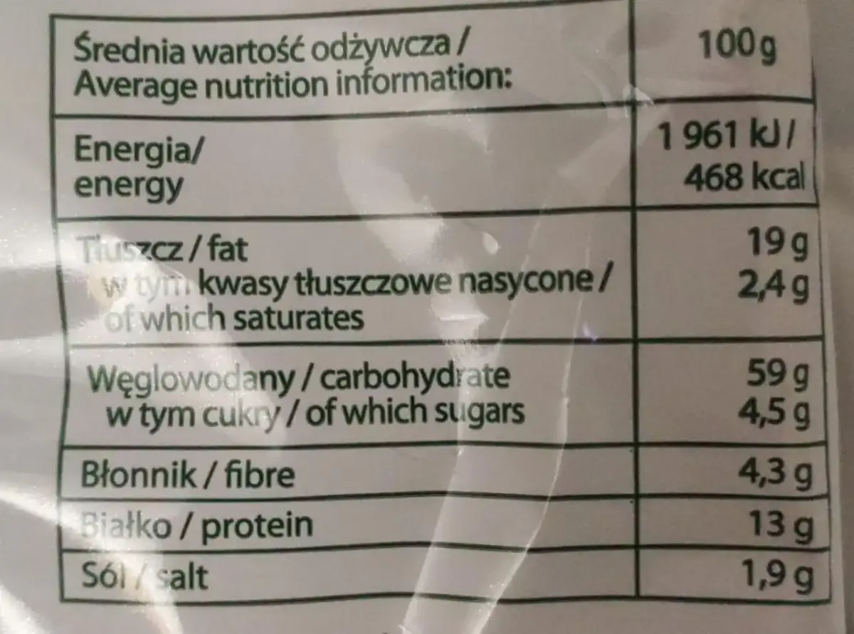 Tabela wartości odżywczych dla 100g produktu: energia, tłuszcz, węglowodany, błonnik, białko, sól.