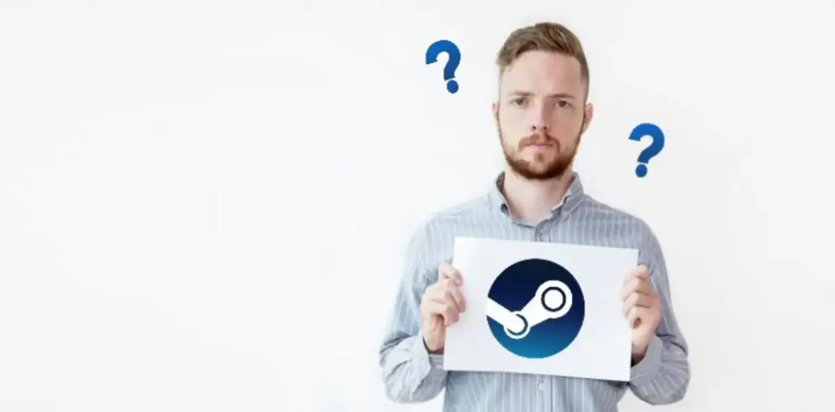 Mężczyzna trzyma kartkę z logo Steam, otoczony znakami zapytania.