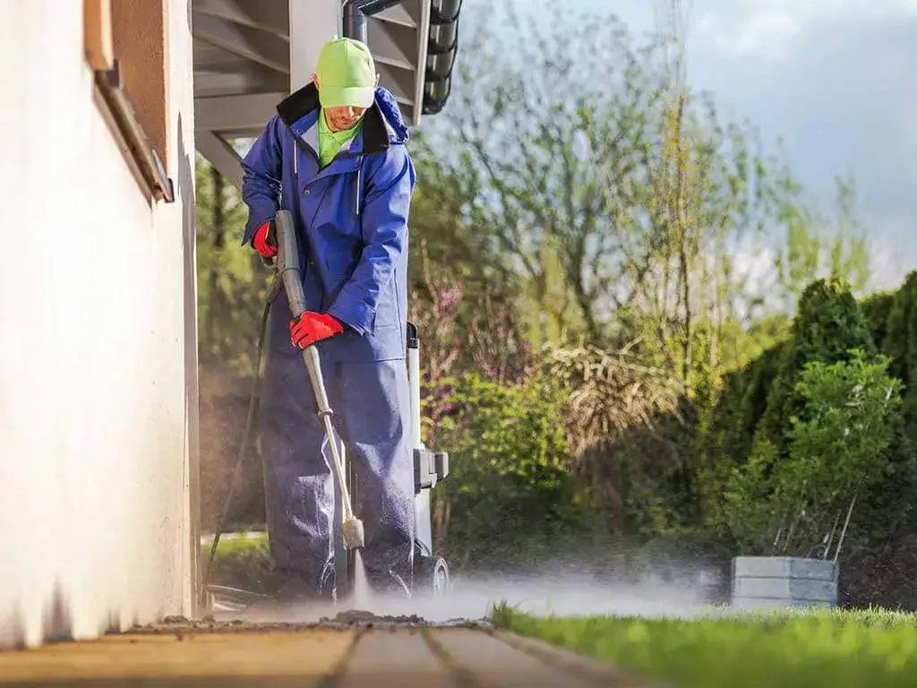 Skuteczne sposoby na zmycie cementu z kostki brukowej bez uszkodzeń