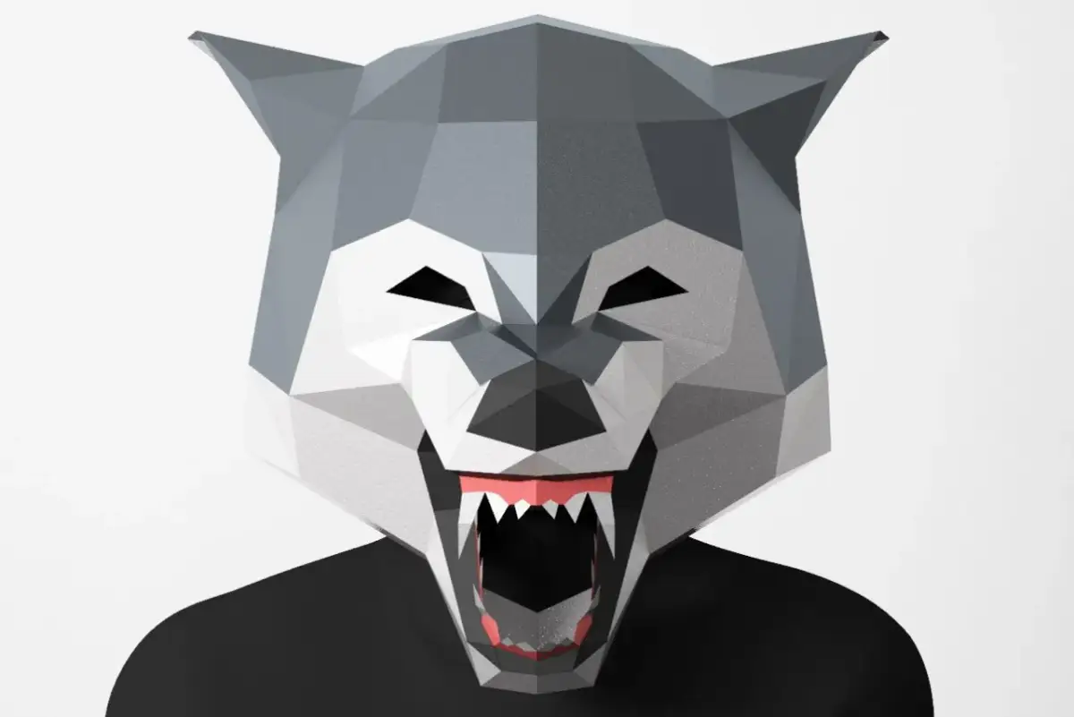 Maska wilka z papieru, idealna, by dowiedzieć się, jak zrobić strój wilka. Wyraziste zęby i oczy dodają jej groźnego wyglądu.