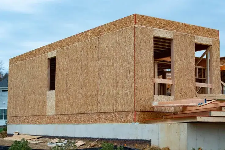Ile kosztuje budowa domu z płyt osb? Odkryj ukryte koszty!