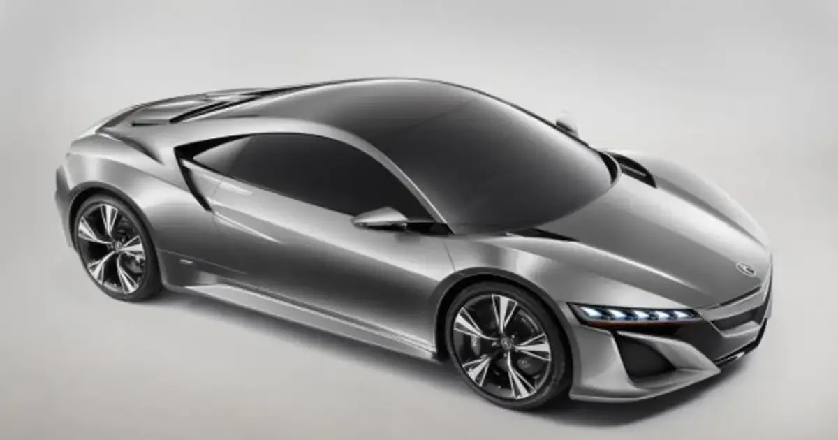 Srebrny, futurystyczny Honda NSX z ostrymi liniami i sportowymi felgami, gotowy do podboju dróg.