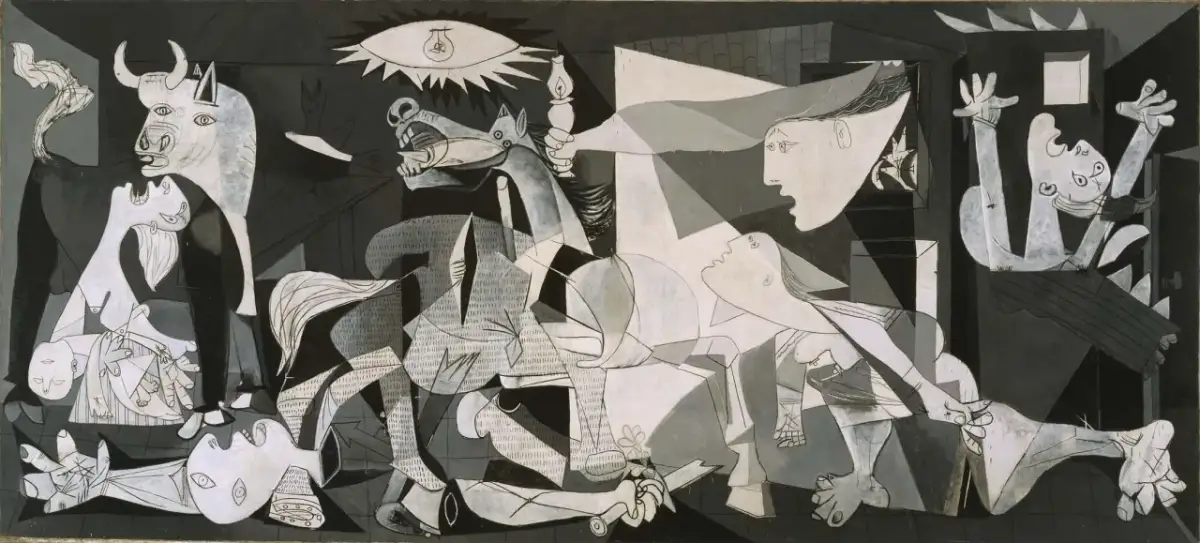 Guernica Picassa w Muzeum Narodowym Centrum Sztuki Królowej Zofii. Dramatyczna scena z bykiem, koniem i cierpiącymi ludźmi.