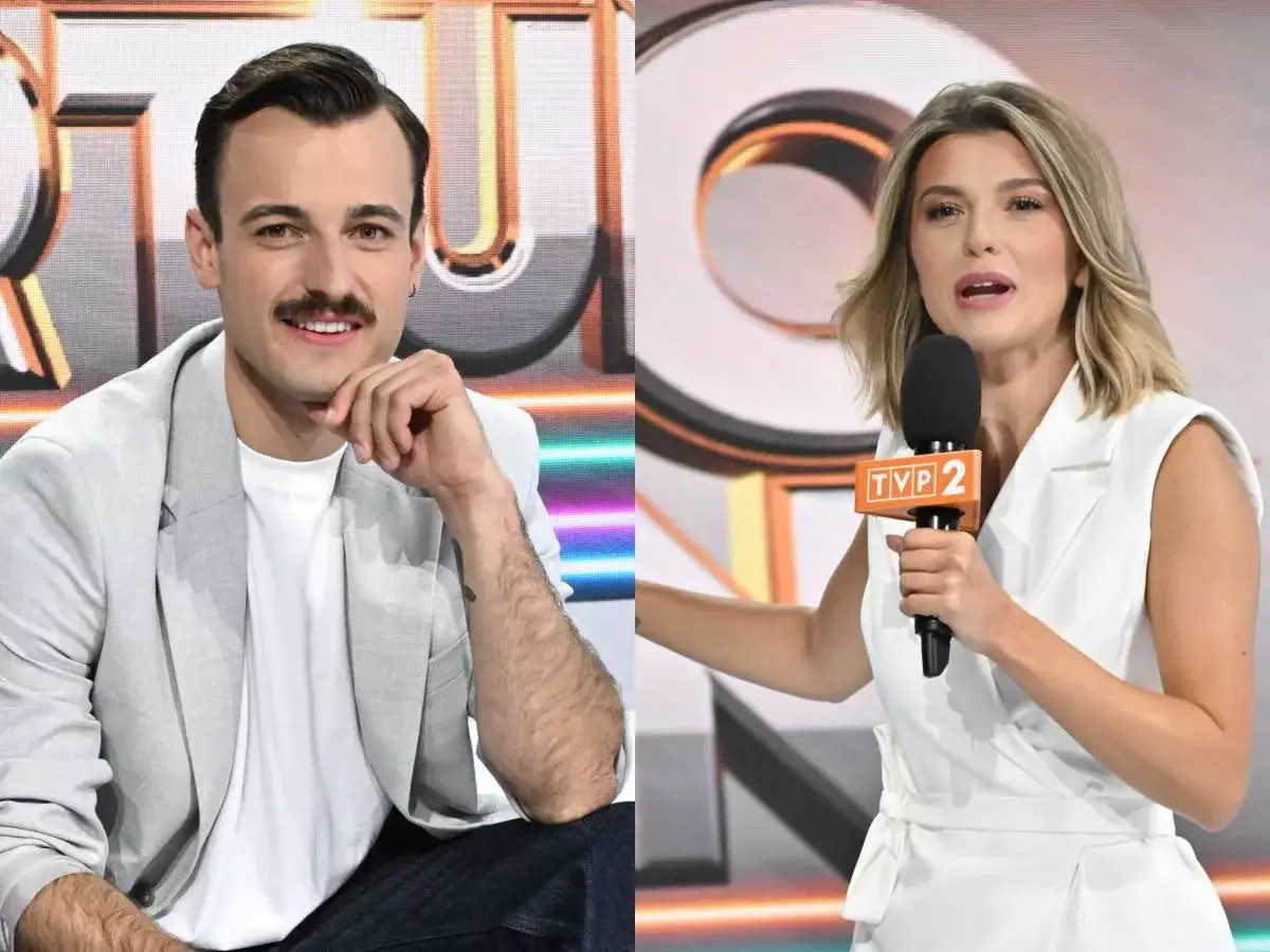 Krzysztof z Koła Fortuny, uśmiechnięty, w jasnej marynarce, obok prezenterki z mikrofonem TVP 2.
