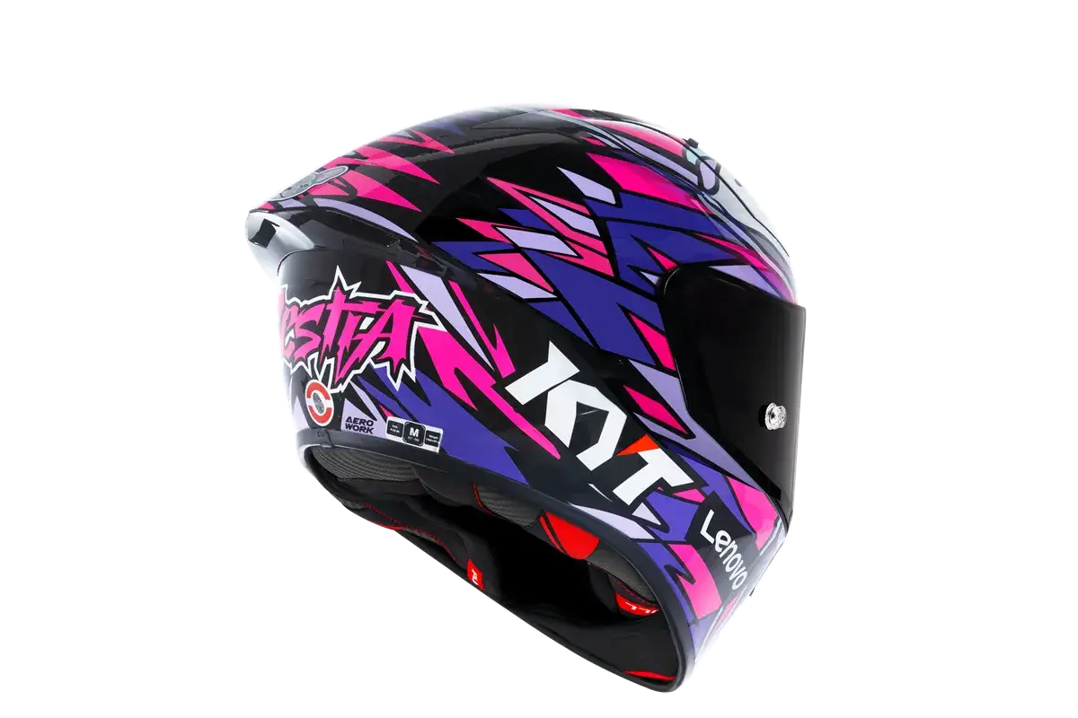 Kask motocyklowy Kyt z grafiką "Sista" w kolorach różowym i fioletowym. Wykonany z poliwęglanu czy włókna szklanego?