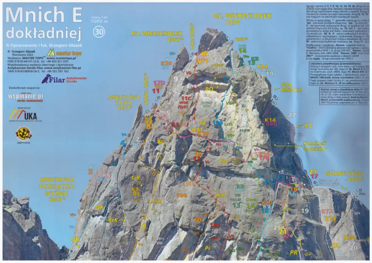 Skała z naniesionymi trasami wspinaczkowymi i ich nazwami.