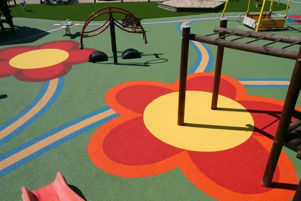 Nawierzchnia pod plac zabaw: Jak wybrać bezpieczne podłoże dla dziecka?