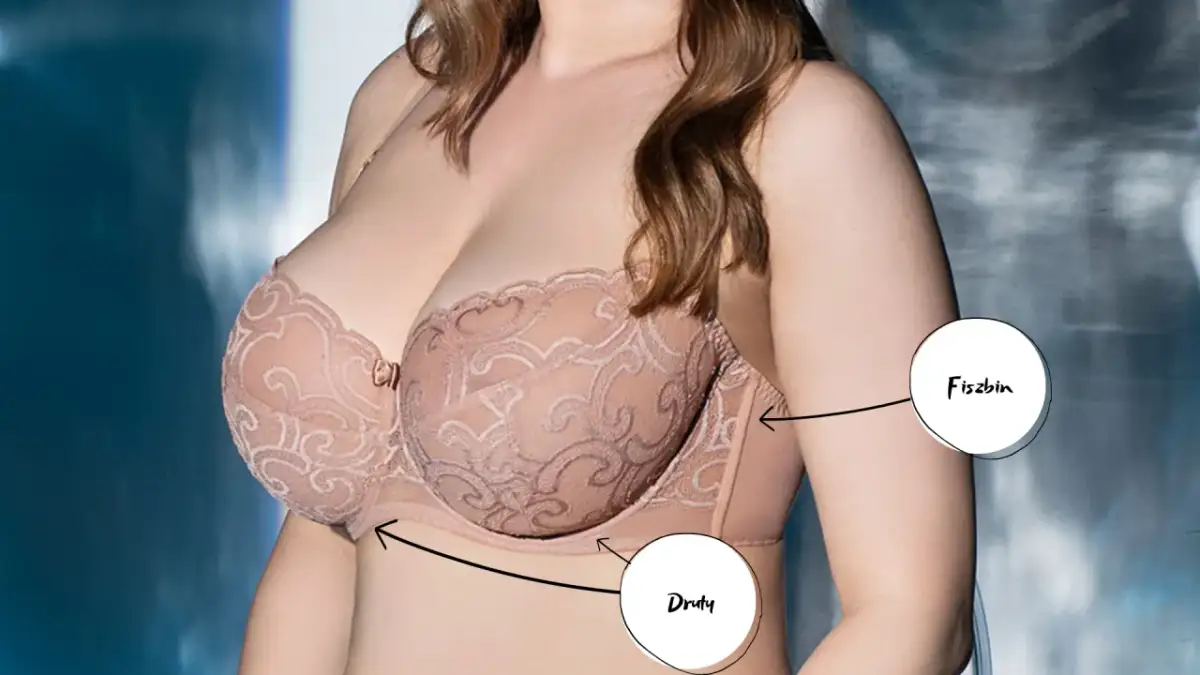 Biustonosz z koronkowymi miseczkami. Strzałka wskazuje fiszbin, który zapewnia wsparcie.