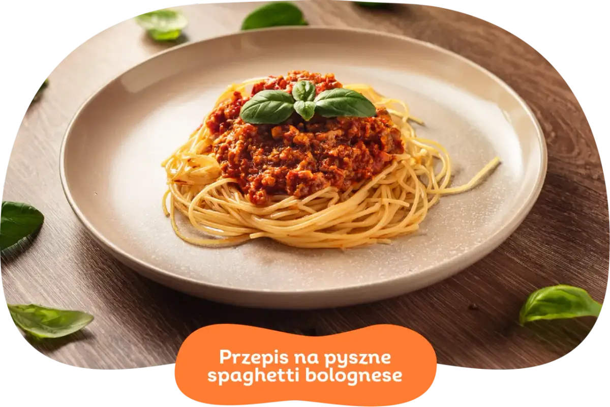 Pyszne spaghetti bolognese z aromatycznym sosem mięsnym i świeżą bazylią. Idealne na szybki obiad.