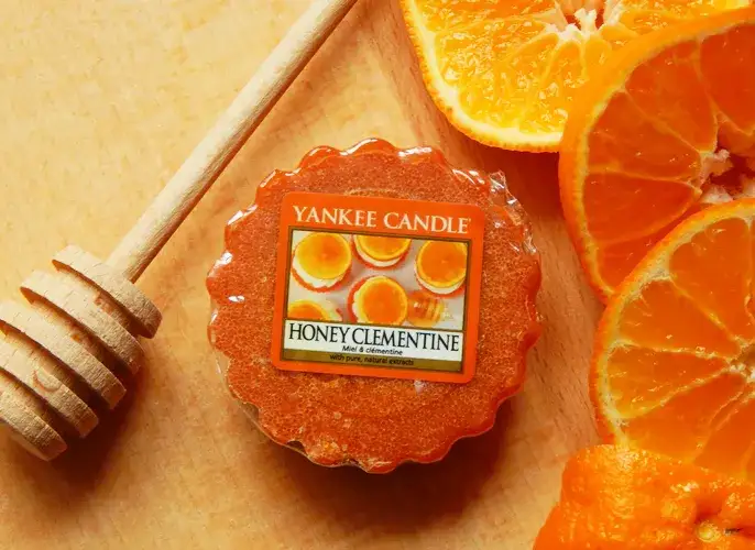 Świeczka o zapachu mandarynki – wprowadź radość i świeżość do domu