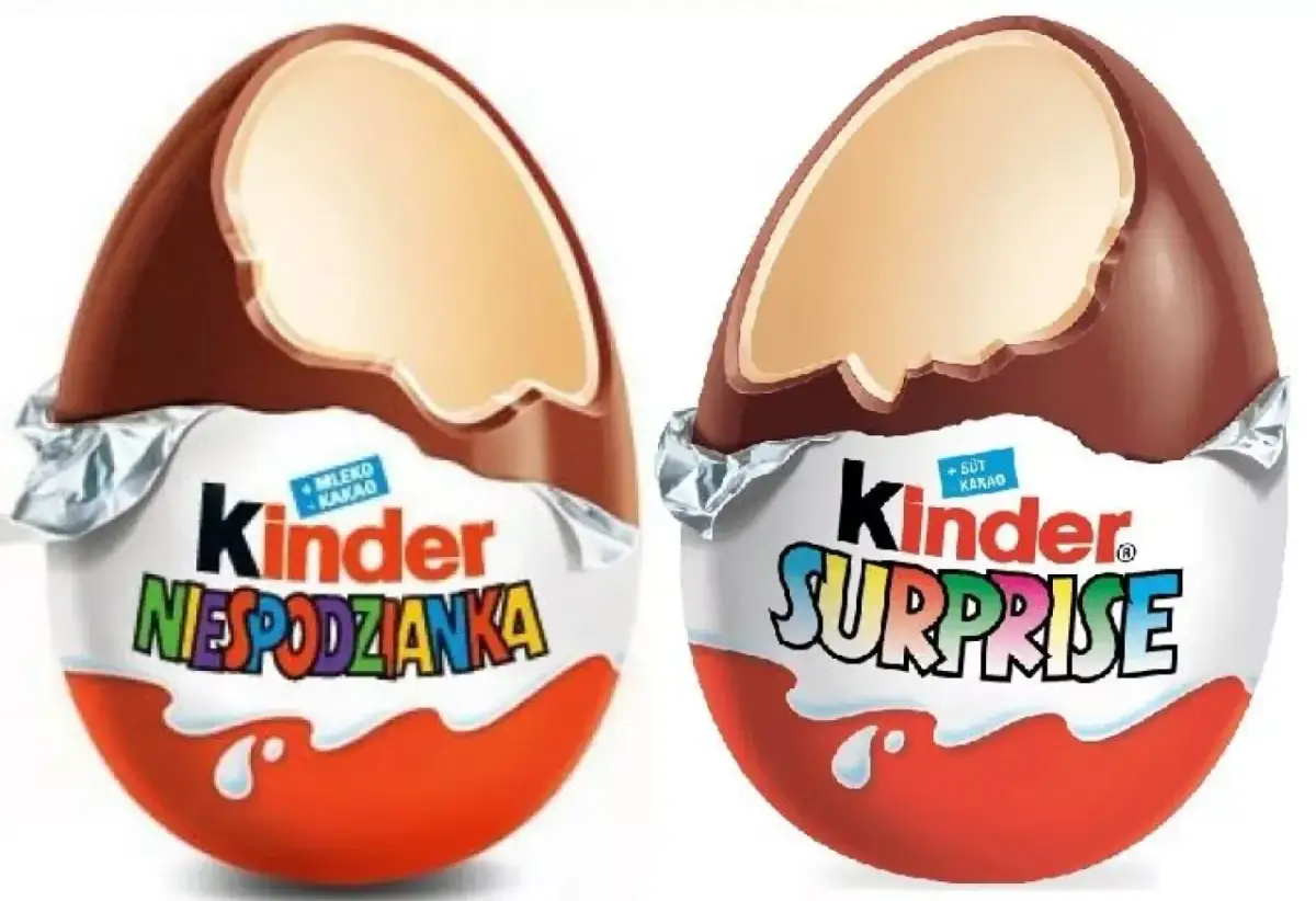 Dwa jajka Kinder Niespodzianka, jedno z napisem "NIESPODZIANKA", drugie "SURPRISE".