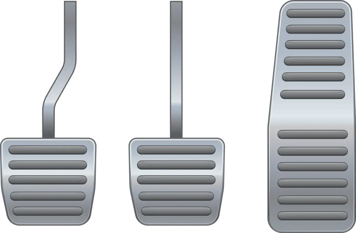 Trzy pedały samochodowe: sprzęgło, hamulec i gaz. Sprzęgło pozwala na zmianę biegów.