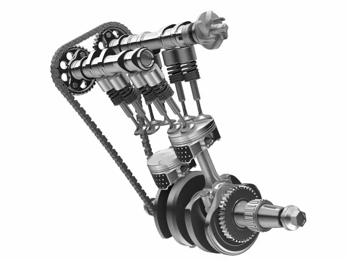 Mechanizm silnika z tłokami i wałkiem rozrządu, który steruje zaworami silnika samochodu.