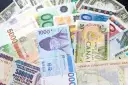 Czy warto inwestować w dolary? Odkryj ryzyka i korzyści tej decyzji