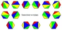 Sześciokąty podzielone na kolorowe trójkąty. Różne kombinacje brył geometrycznych.