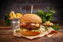 Pyszny burger z serem i bekonem, idealny na obiad. Ten burger przepis to marzenie każdego smakosza.