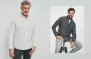 Mężczyźni w koszulach. Biała koszula slim fit podkreśla sylwetkę, szara wygląda swobodnie.