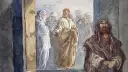 Jezus w złotej szacie przemawia do ludzi, przypominając o głównych prawdach wiary. Obok stoi mężczyzna w brązowym płaszczu.