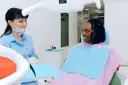 Afta i dentysta: Przełożyć wizytę czy iść? Decyzja eksperta