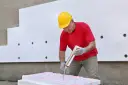 Ile kleju do styropianu na 100m2? Uniknij kosztownych błędów