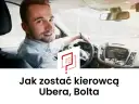 Uśmiechnięty mężczyzna za kierownicą samochodu. Dowiedz się, jak zostać kierowcą Ubera i zacząć zarabiać.