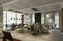 Nowoczesny salon z wygodnymi sofami, stolikami i dziełami sztuki na ścianach. Idealne miejsce na **puro** relaks.