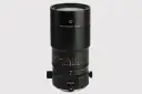 Czarny obiektyw makro 100mm f/2.8 z oznaczeniami odległości i przysłony.
