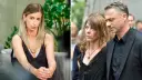 Dominika Laskowska w czarnej sukience i mężczyzna w garniturze, oboje zamyśleni.