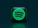 Ikona Spotify na ciemnozielonym tle.