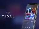 Logo Tidal i ekran smartfona z interfejsem aplikacji muzycznej.
