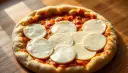 Najlepsza mozzarella do pizzy: Wybierz i przygotuj jak pro!