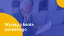 Starszy mężczyzna analizuje dokument, być może zastanawia się, jak uzyskać wyciąg bankowy.