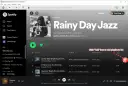 Okładka playlisty "Rainy Day Jazz" na Spotify, z widocznym interfejsem aplikacji i przyciskiem dodawania.
