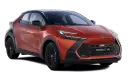 Pomarańczowy Toyota C-HR Hybrid, ciekawy design, niskie spalanie.
