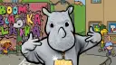 Ein Nashorn mit Goldkette und Graffiti im Hintergrund.