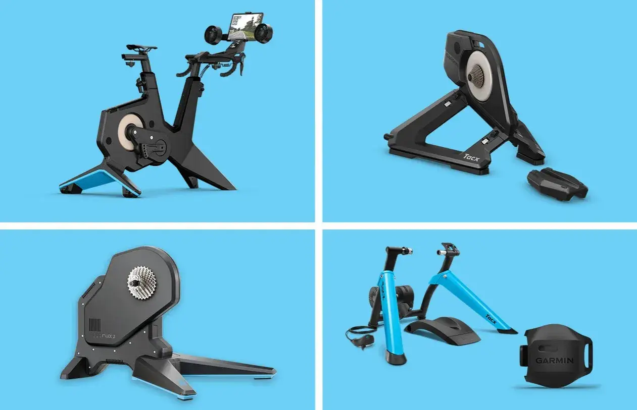 Różne modele trenażerów rowerowych, w tym Tacx Flux 2, pozwalają na trening w domu.