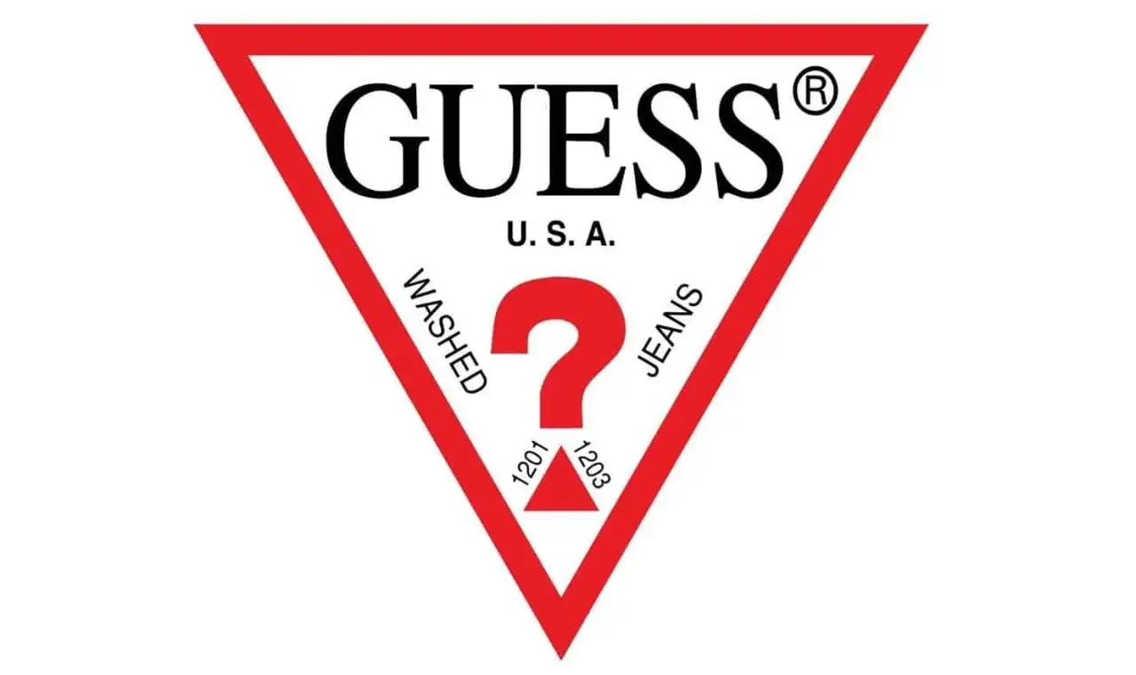 Logo Guess, marka premium, z charakterystycznym czerwonym trójkątem i znakiem zapytania.