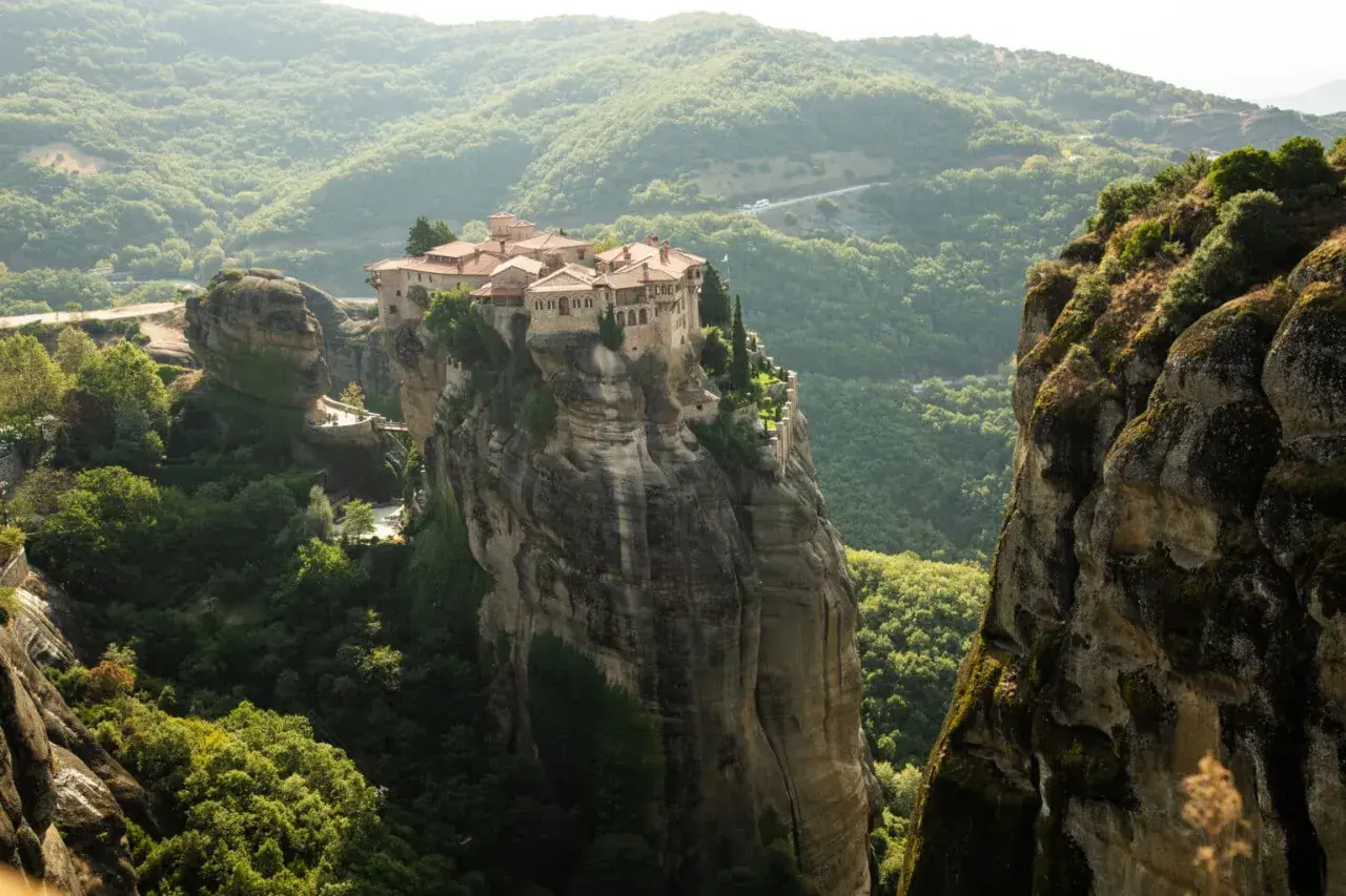 A breathtaking view of the Meteora monasteries perched atop towering rock formations, a must-see for any Greece meteora guide.