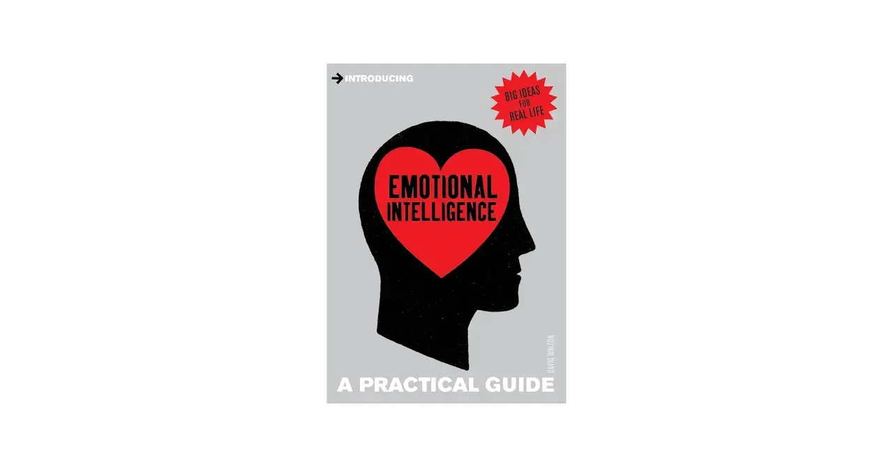 Book cover: "Emotional Intelligence: A Practical Guide." A silhouette of a head contains a red heart with the title. This guide fosters care and compassion.