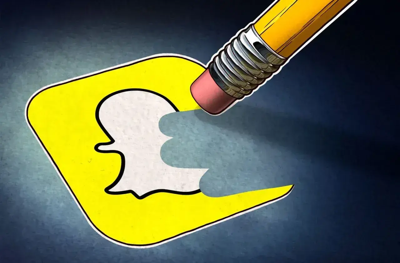 Gumka ołówka ściera logo Snapchata, symbolizując, jak usunąć konto na Snapie.