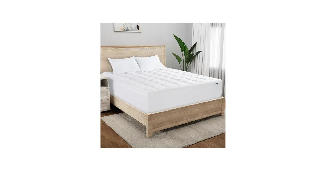 A Serta mattress topper on a bed. Wondering how long does a Serta mattress take to expand? This topper is ready for sleep.
