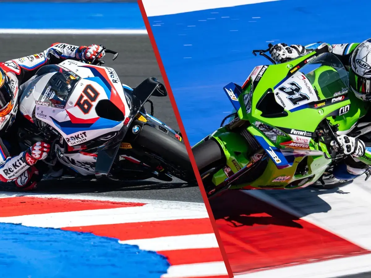 Dos motos de **BMW MotoGP** compiten en una carrera, una blanca y roja con el número 60, la otra verde con el número 31.