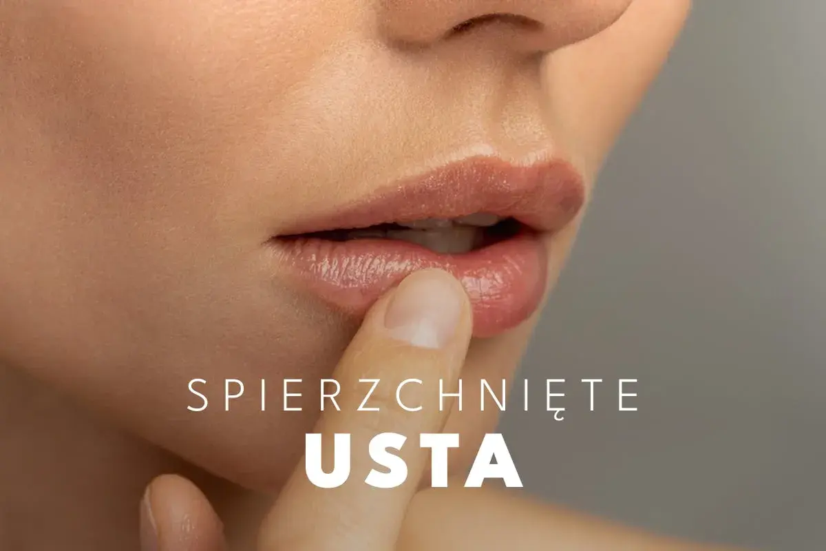 Delikatne usta dotykane palcem, szukające ukojenia. Co na suche usta?