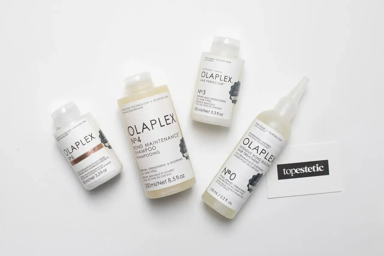 Zestaw produktów Olaplex: szampon, odżywka, kuracja i krem do stylizacji. Dowiedz się, olaplex co to za magia dla włosów.